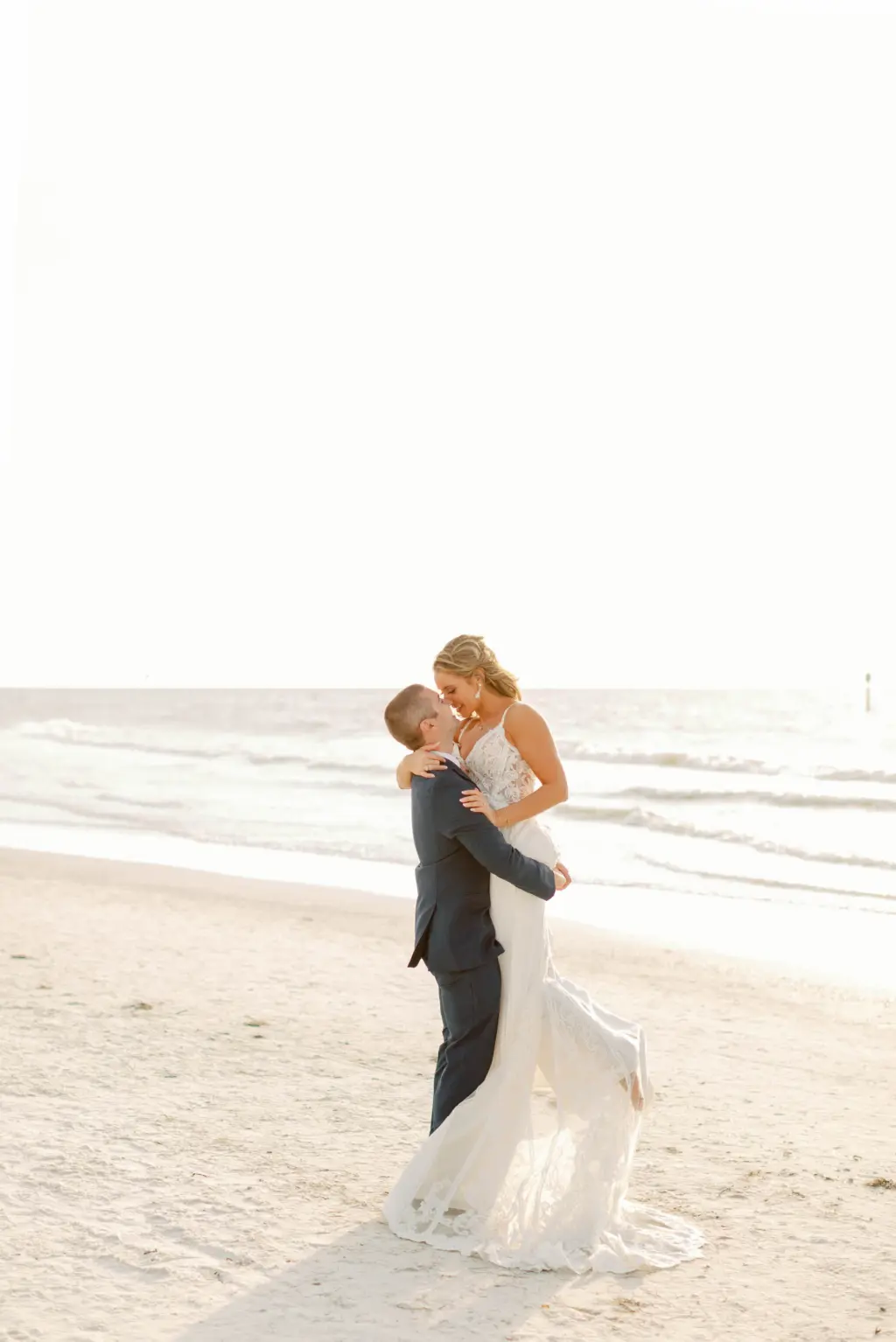 Bride and Groom Beach Wedding Portrait Inspiration | Venue Wyndham Grand Clearwater Beach