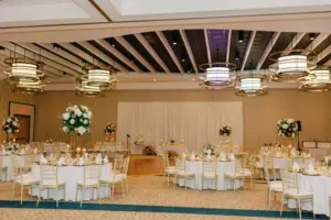 Gold Elegant Wedding Reception with Gold Chiavari Chairs, White Linen Circle Table Ballroom Inspiration | Venue Wyndham Grand Clearwater Wedding | Draping Outside the Box Rentals