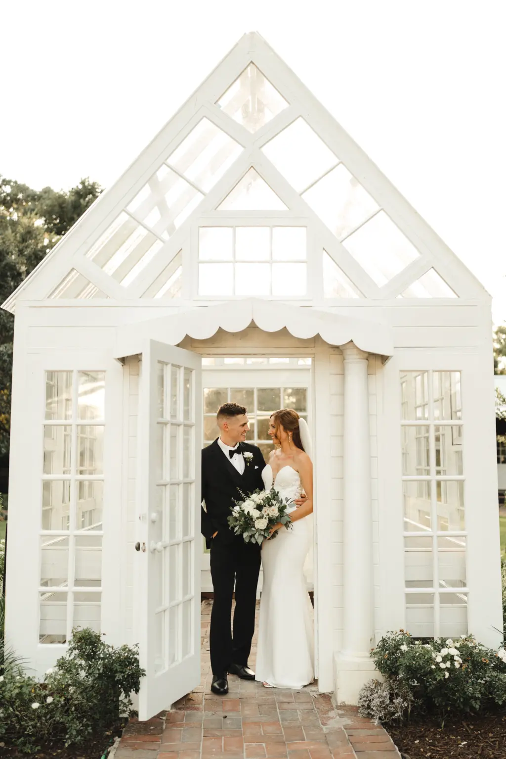 Bride and Groom Greenhouse Wedding Portrait | Tampa Bay Nature-Inspired Venue Cross Creek Ranch