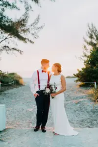 Bride and Groom Watching the Sunset at the Beach Wedding Portrait | Tampa Bay Photographer Amber McWhorter Photography