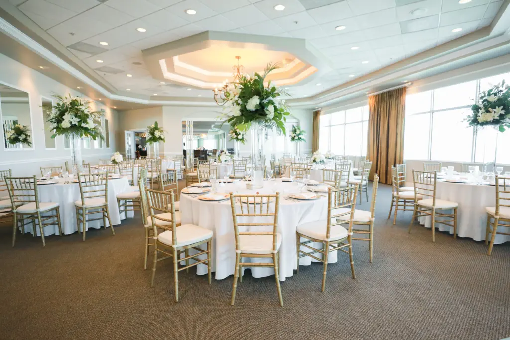 Grand Ballroom Old Florida Wedding Reception Inspiration with Gold Chiavari Chairs and Tall White Flower Centerpieces | Tampa Bay Rentals A Chair Affair | Venue Isla Del Sol Yacht Club