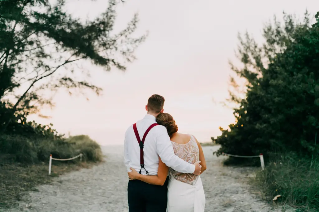 Bride and Groom Watching the Sunset at the Beach Wedding Portrait | St Pete Beach Photographer Amber McWhorter Photography
