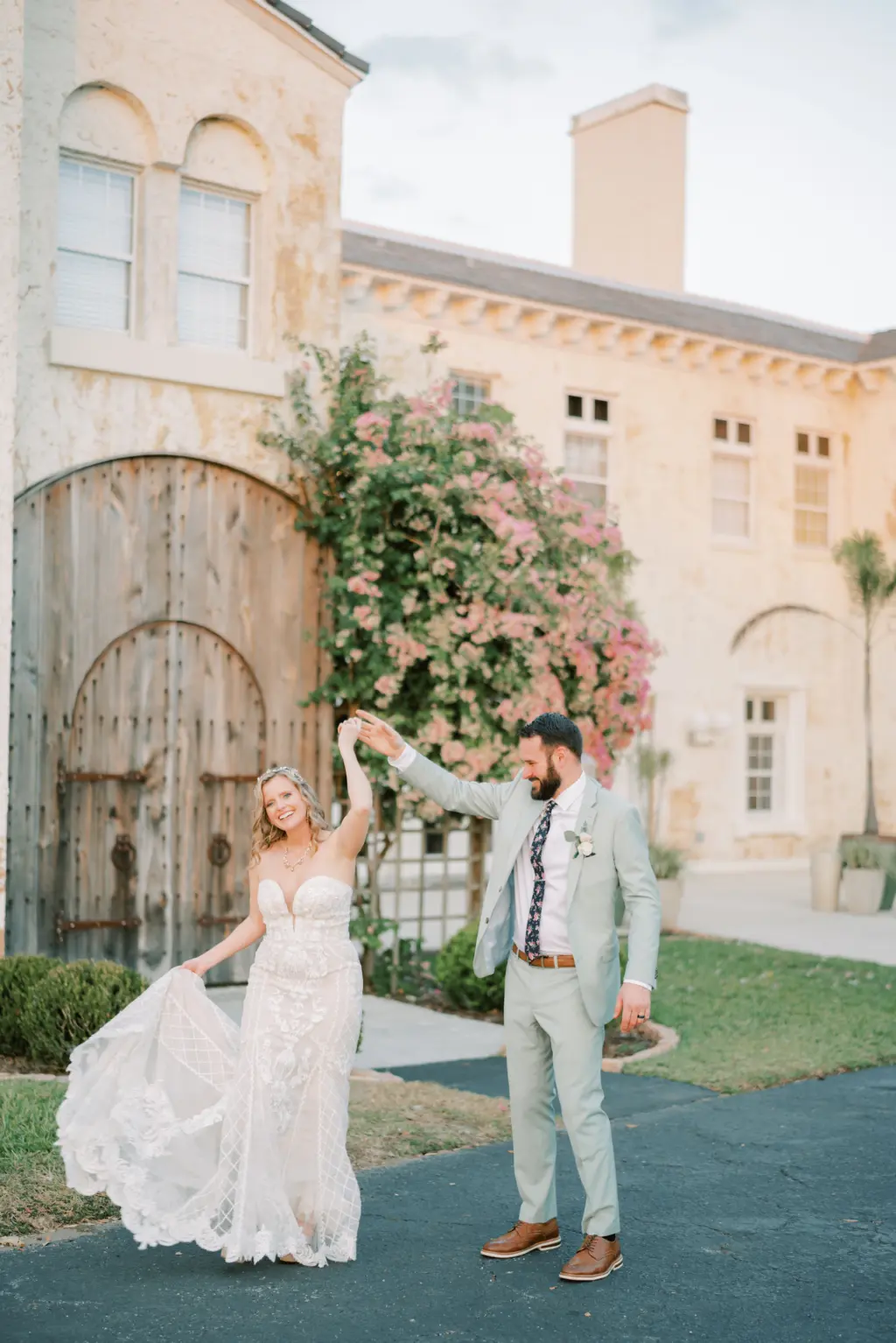 Bride and Groom Dancing in the Road Wedding Portrait | Central Florida Planner B Eventful | Venue Lake Wales Bella Cosa Lakeside