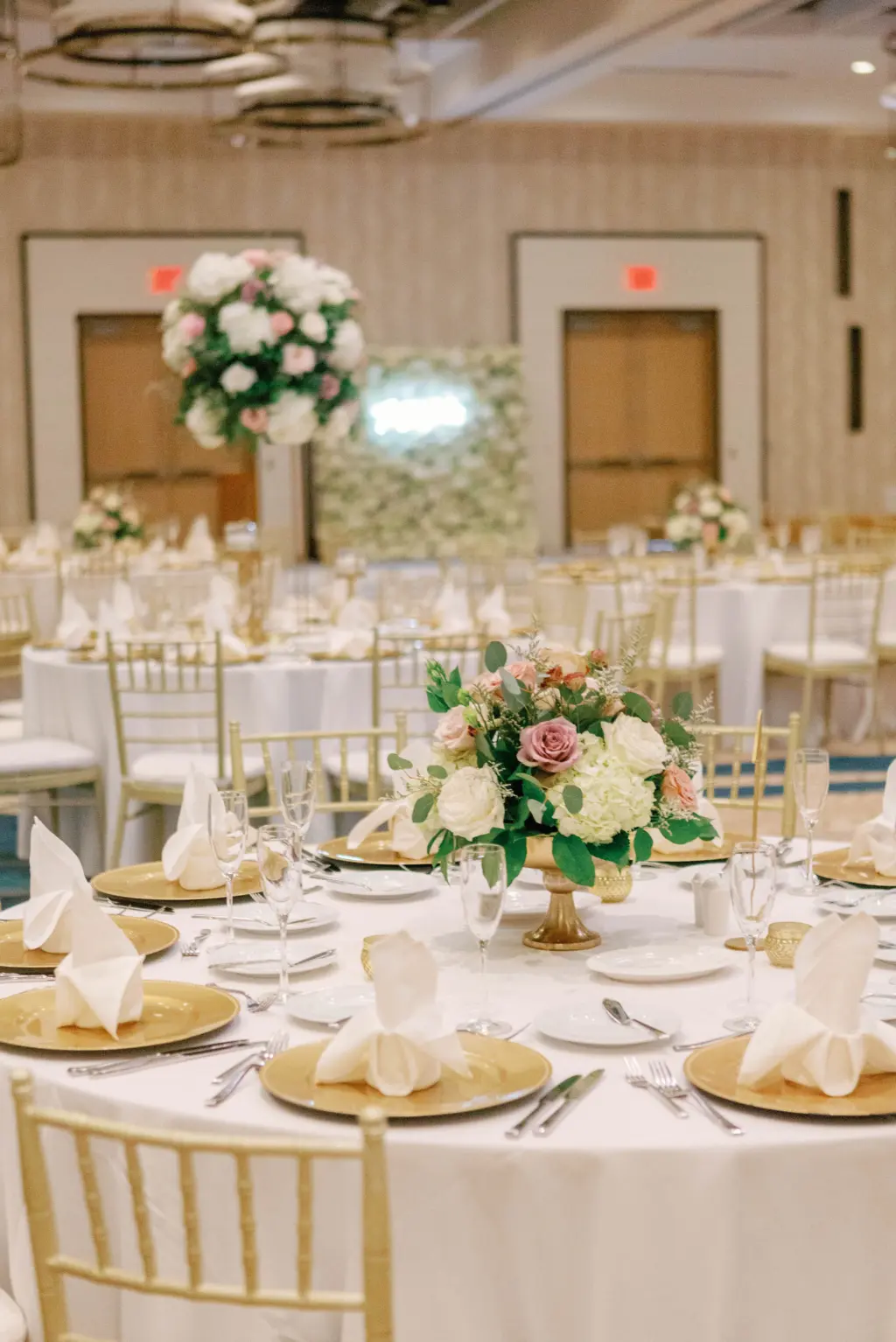 Gold Elegant Wedding Reception with Gold Chiavari Chairs, White and Pink Centerpiece Ballroom Inspiration