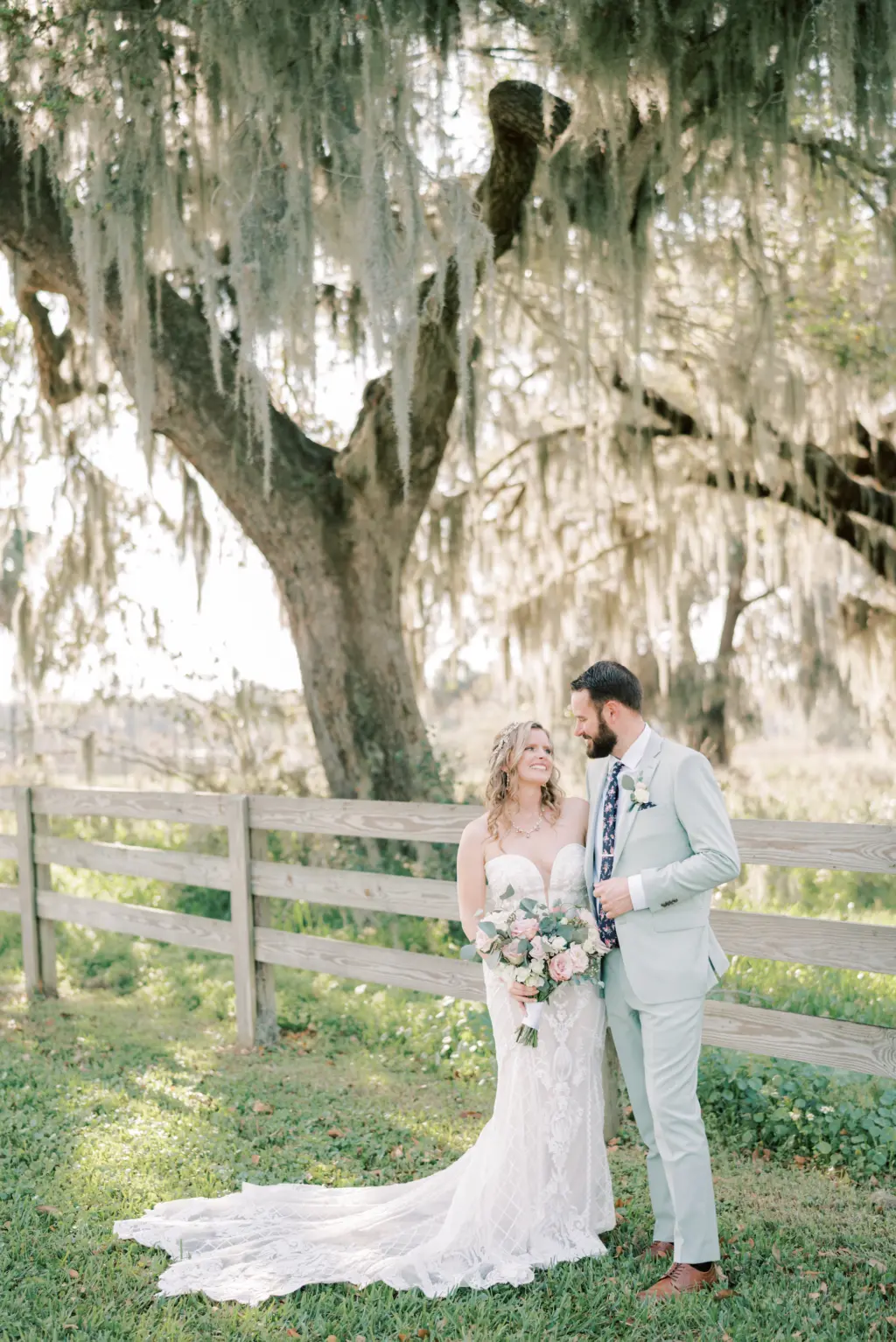 Bride and Groom Oak Tree Wedding Portrait | Venue Lake Wales Central Florida Bella Cosa Lakeside