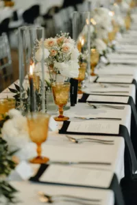 Timeless Black and White Wedding Reception Long Feasting Tablescape Decor Inspiration | Amber Water Goblets | Thank You Placecard Ideas | Tampa Bay Kate Ryan Event Rentals | Planner Coastal Coordinating
