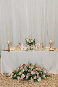 Elegant and Romantic Sweetheart Table with Spring Blush Pink, White, and Mauve Florals with Greenery Inspiration | Tampa Draping Outside the Box Rentals
