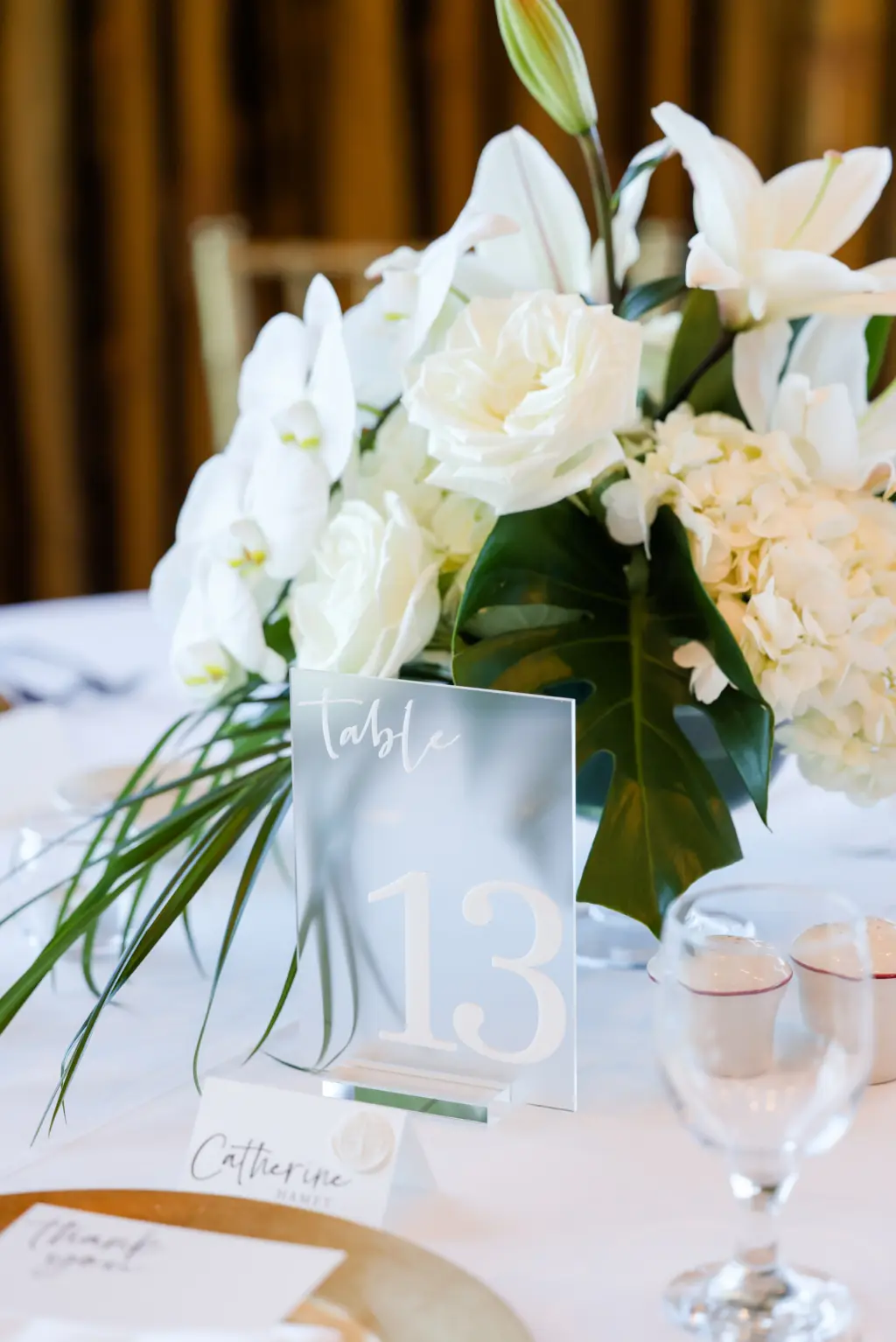 Frosted Acrylic Table Numbers for Wedding Reception | Tropical Palm Leaf, Garden Rose, Orchids, and Hydrangeas Centerpiece Ideas