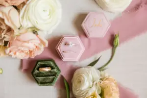 Romantic Blush and Green Velvet Ring Boxes Flatlay with peach and Cream Whimsical Florals