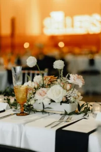 Modern White and Black Wedding Reception Decor Inspiration | Amber Goblets | White Roses, Carnations, Pink Roses, and Baby's Breath Centerpiece Ideas | Tampa Bay Planner Coastal Coordinating
