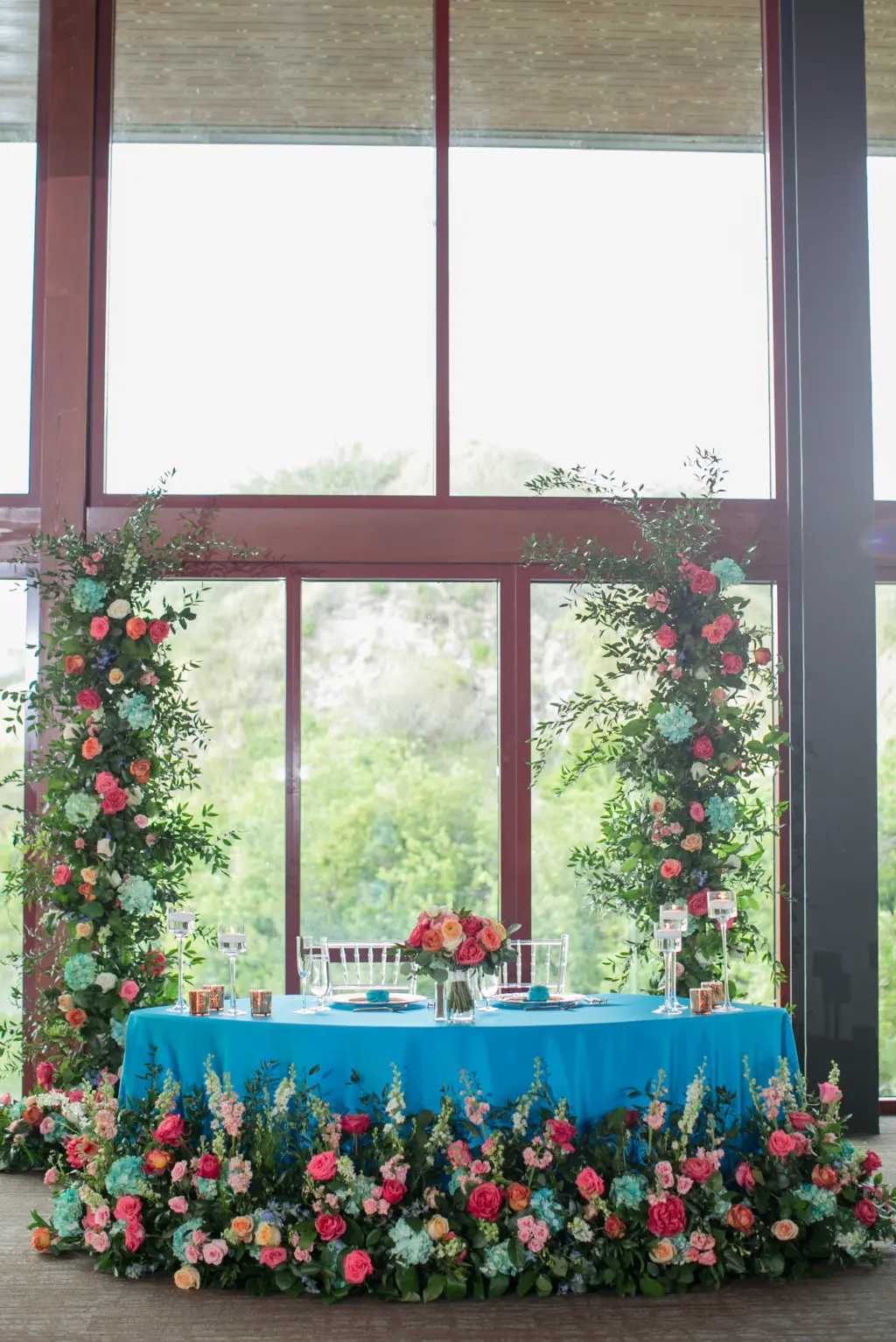Summer Turquoise Linen Sweetheart Table Inspiration with Floral Arch and Detailing Decor | Rentals Tampa Bay A Chair Affair | Florist Tampa Monarch Events and Designs