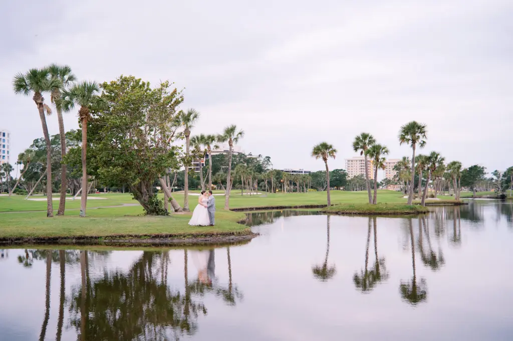 Bride and Groom on the Golf Course at The Resort at Longboat Key Club Sarasota Wedding Venue