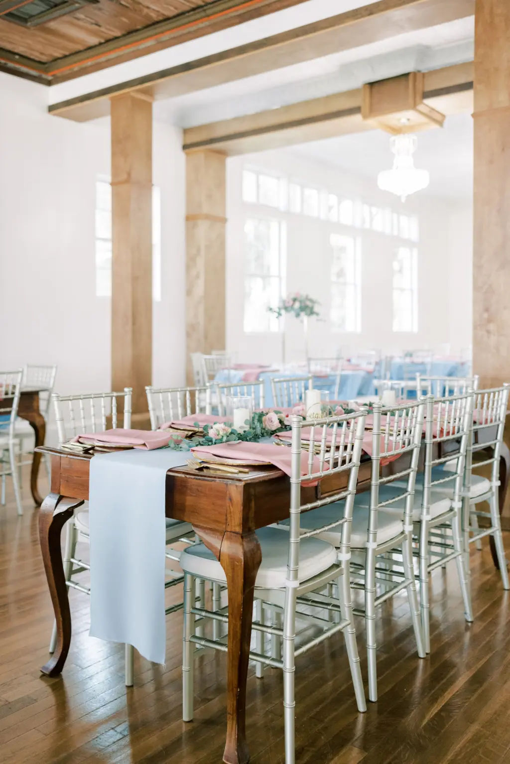 Indoor Dusty Blue and Pink Wedding Reception Inspiration with Silver Chiavari Chairs | Tampa Bay Rental Company A Chair Affair