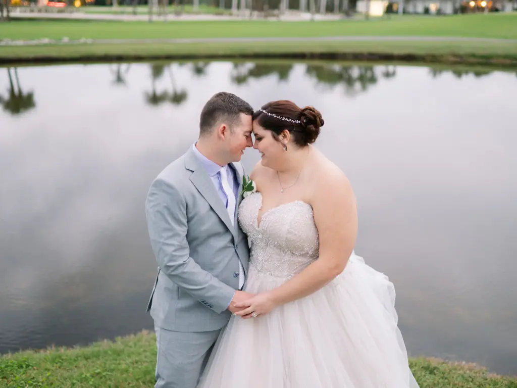 Bride and Groom on the Golf Course at The Resort at Longboat Key Club Sarasota Wedding Venue