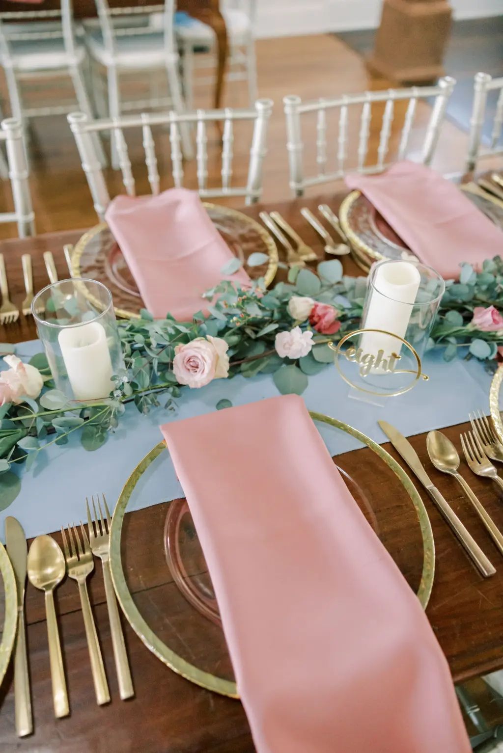 Dusty Pink Napkins, Dusty Blue Table Runner | Gold Flatware and Gold-rimmed Chargers | Tampa Bay Rental Company A Chair Affair