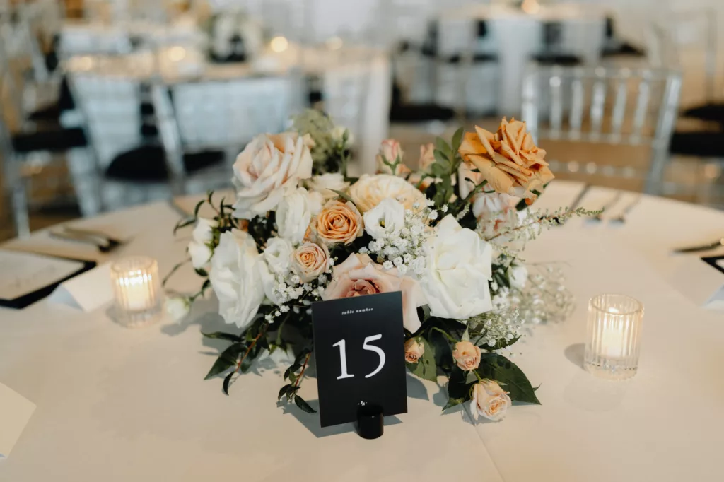 Modern Black Table Number Sign with Baby's Breath, White and Pink Roses, and Greenery Centerpiece Ideas
