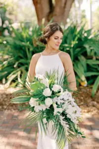 High Neck A Line Simple Classic Wedding Dress with Tropical White Orchid Bridal Bouquet Wedding Inspiration | Classic Bridal Updo with Soft Glam Makeup | Tampa Wedding Hair and Makeup Artist Femme Akoi