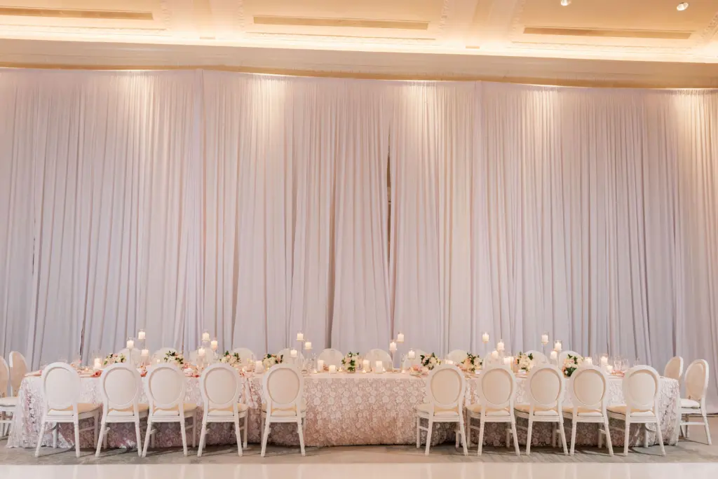 Old Florida Wedding Reception Drapery Ideas | Long Feasting Head Table | St. Petersburg Draping and Table Rentals Gabro Event Services
