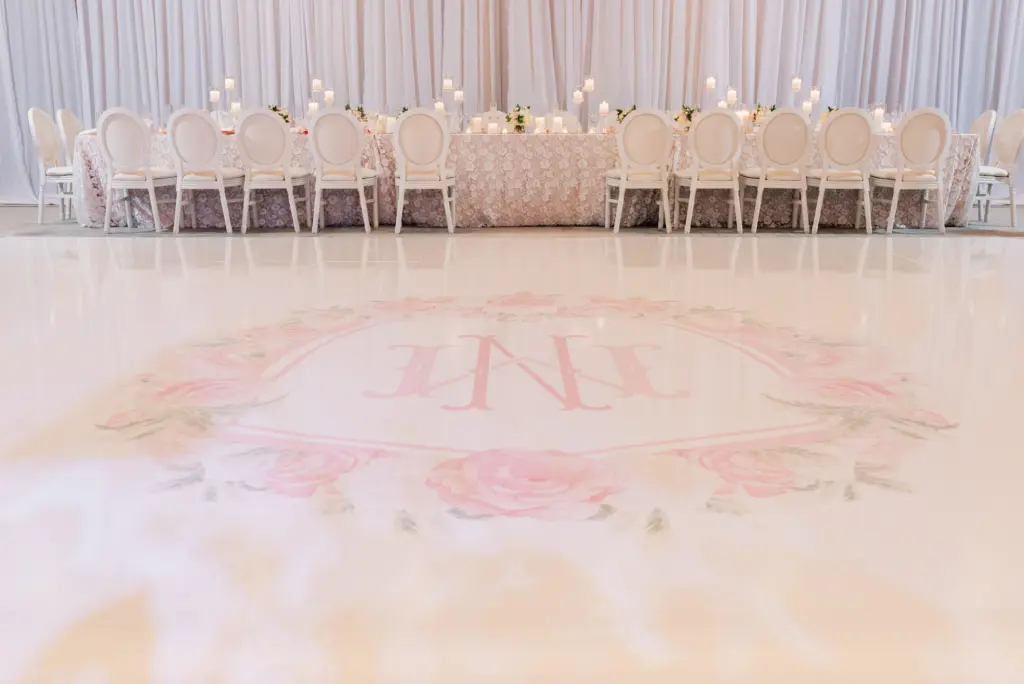 Custom Monogram Logo Pink, White, and Green Floral Dance Floor Wrap for Old Florida Wedding Reception Ideas | Long Feasting Head Table | St. Petersburg Rentals Gabro Event Services