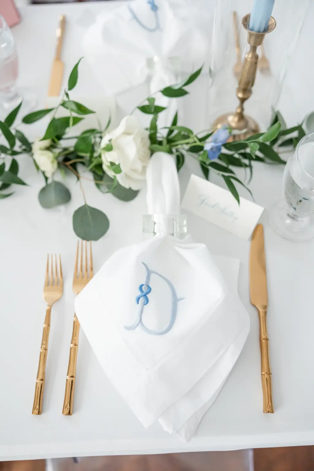 Custom Embroidered Napkins for Wedding Guests | Gold Flatware | Greenery Garland | White and Blue Wedding Reception Inspiration | Tampa Bay Kate Ryan Event Rentals | Planner Kelci Leigh Events