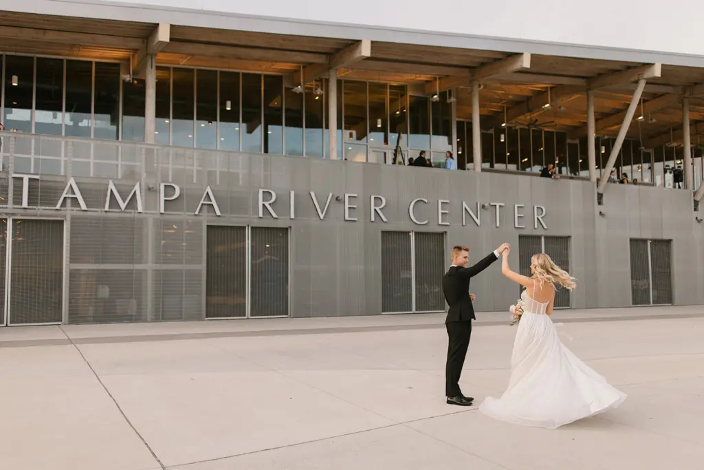 Bride and Groom Dancing in Front of Wedding Venue | Florida Event Venue Tampa River Center