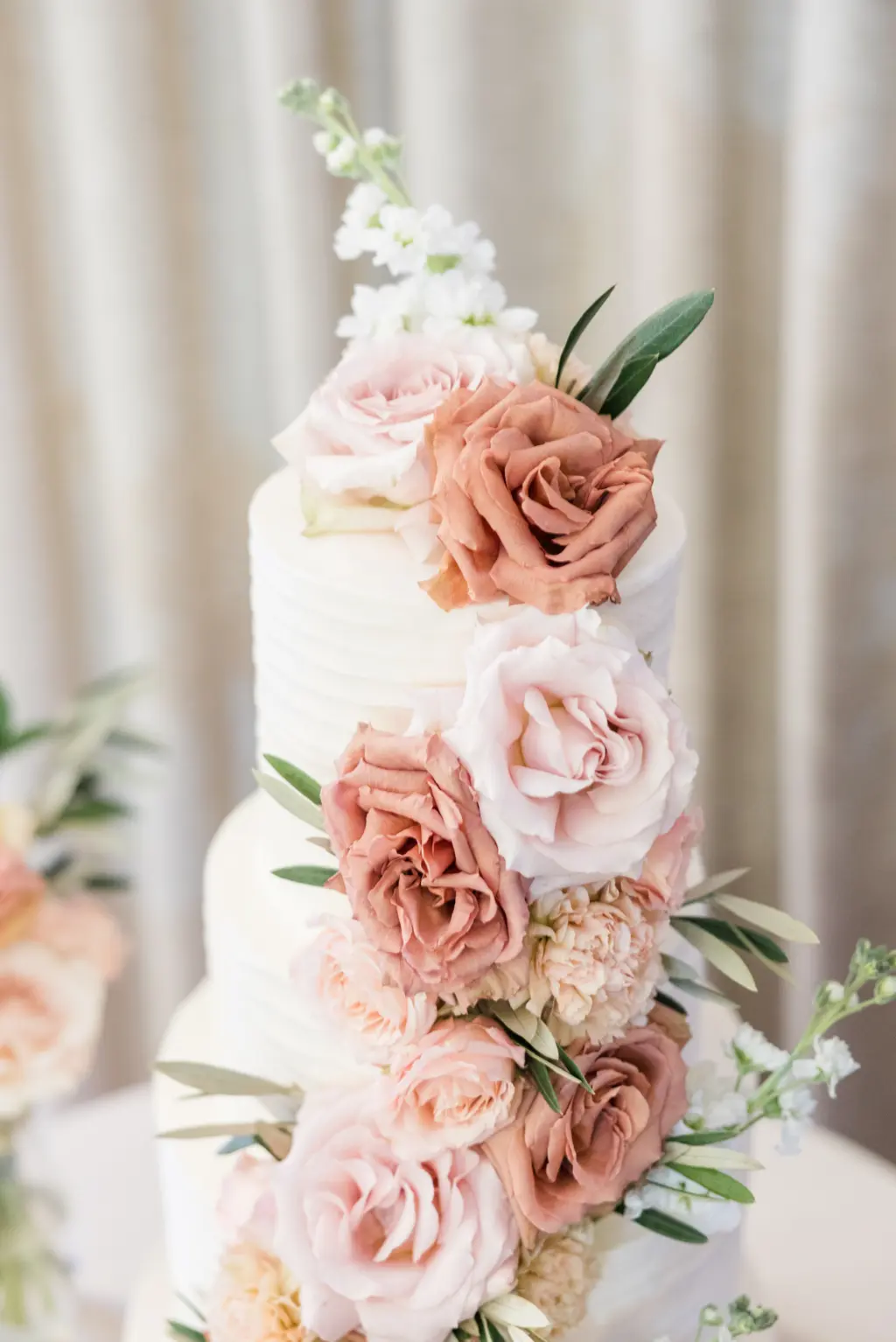 Four Tier White Romantic Wedding Cake Inspiration with Blush and Pink Rose Floral Detailing