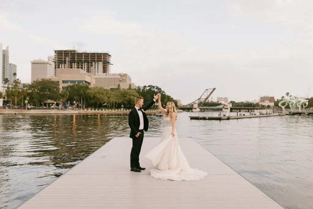 Bride and Groom Dancing Along the Hillsborough River at Tampa Bay Wedding Venue Ideas | Downtown Heights Event Venue Tampa River Center | Planner Coastal Coordinating