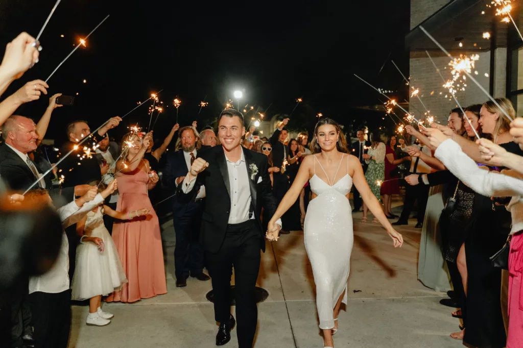 Bride and Groom Wedding Reception Grand Exit | Sparkler Send Off Ideas | Tampa Photographer and Videographer J & S Media | Planner Coastal Coordinating