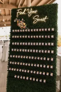 Find Your Sweet Dessert Wall Ideas for Wedding Reception Seating Chart | Tampa Bay Event Rentals A Chair Affair Boxwood Hedge Greenery Wall