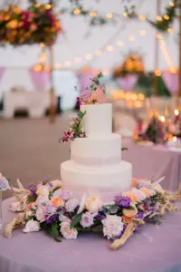 Round Three-tiered Purple and White Wedding Cake