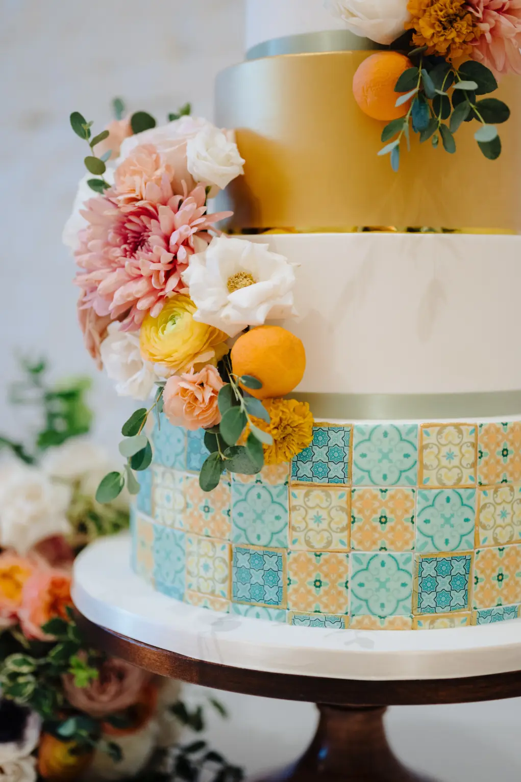 Whimsical Modern Round Four-tiered Wedding Cake | Blue and Orange Fondant Tile Cake Design Ideas | Pink and Orange Wedding Reception Inspiration