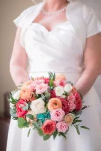 Orange, Pink, and Turquoise Summer Inspired Wedding Bouquet in Bridal Portrait | Tampa Wedding Dress Boutique Truly Forever Bridal Tampa | Tampa Wedding Florist Monarch Events and Designs