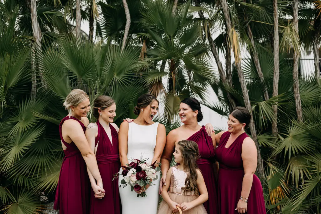 Burgundy Infinity Wrap Bridesmaids Dress Ideas | White Boat Neck Fit and Flare Wedding Dress | Tampa Bay Hair and Makeup Artist Femme Akoi Beauty Studio