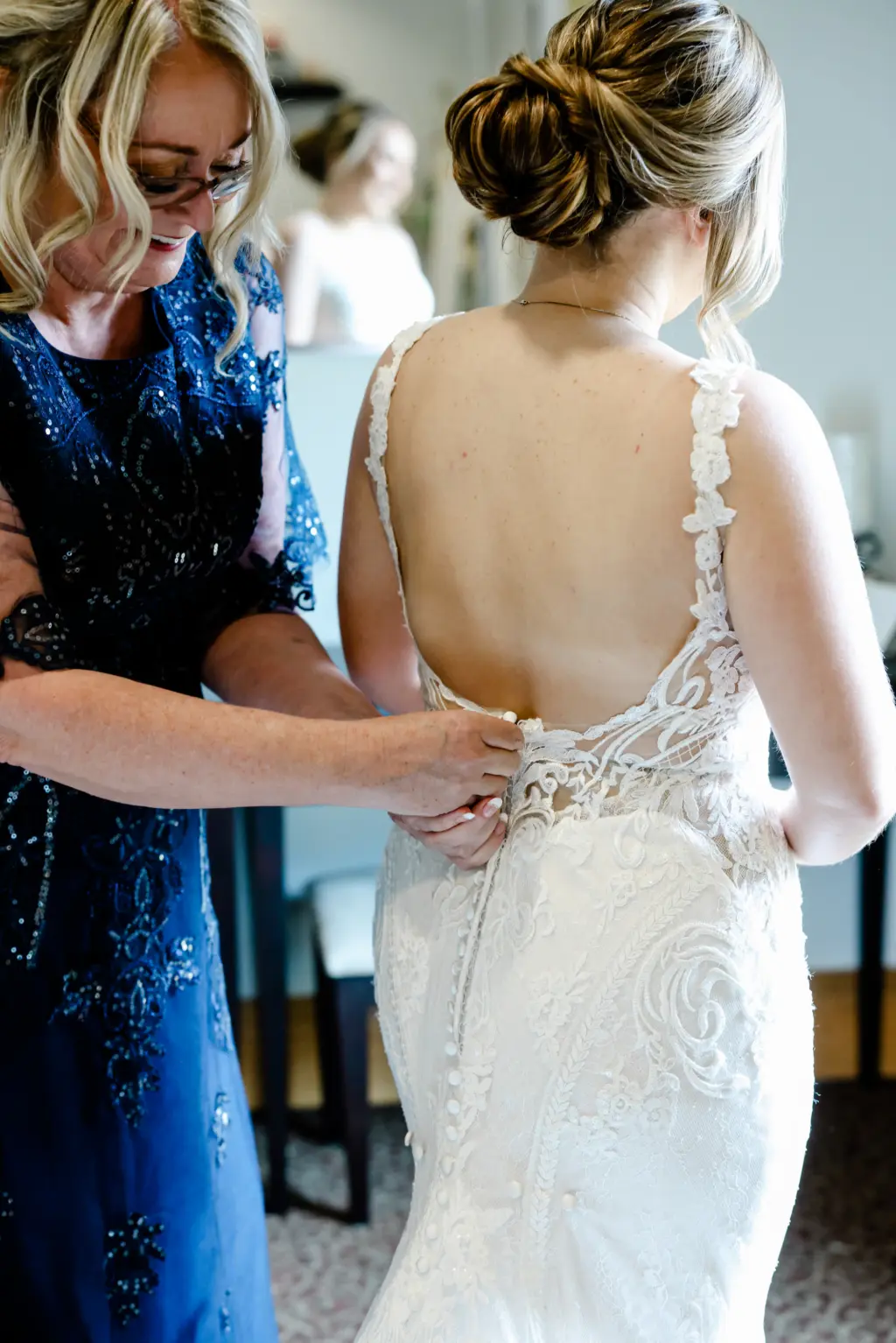 White Open-back Sheer Lace Bodice Mermaid Wedding Dress | Bridal Bun Updo Inspiration | Tampa Bay Hair and Makeup Artist Michele Renee The Studio