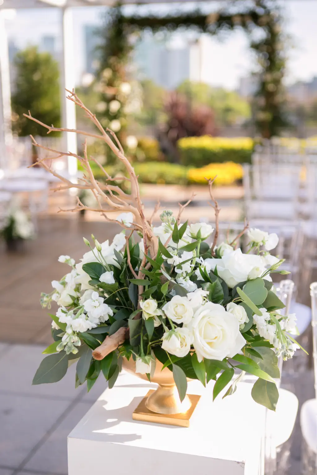 White Roses, Stock Flowers, and Greenery with Wood Branch | Wedding Ceremony Aisle Decor Ideas