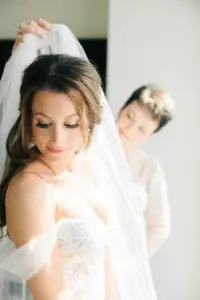 Mother of the Bride Helping Bride Get Ready Wedding Portrait | | Blue by Enzoani Dress Inspiration