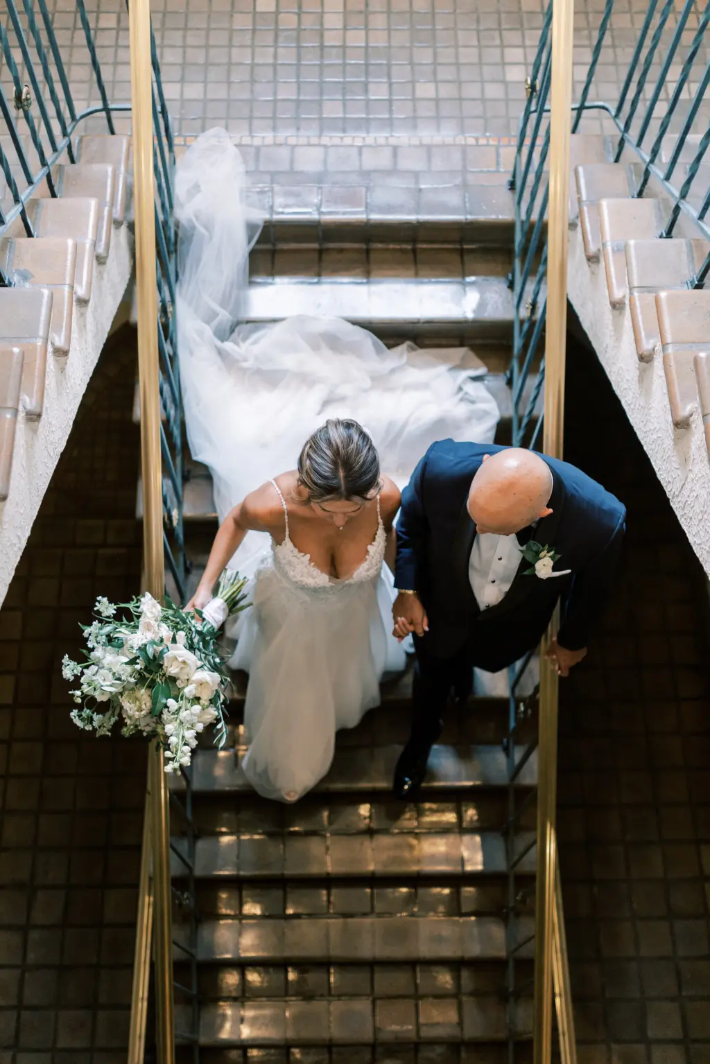 Bride and Groom Just Married, Walking Down Stairs Wedding Portrait