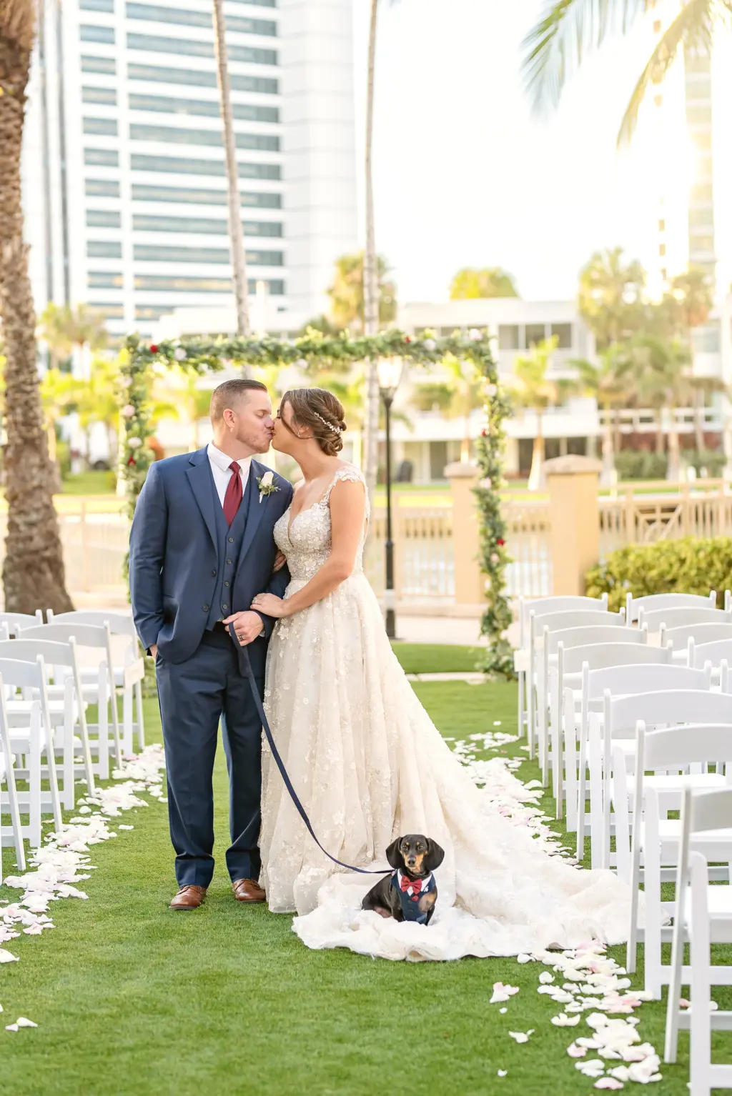 Bride and Groom Just Married with Dog Wedding Portrait | Sarasota Dog Sitting Company FairyTail Pet Care | Wedding Dog Tuxedo with Bow Tie | Venue Ritz Carlton Sarasota