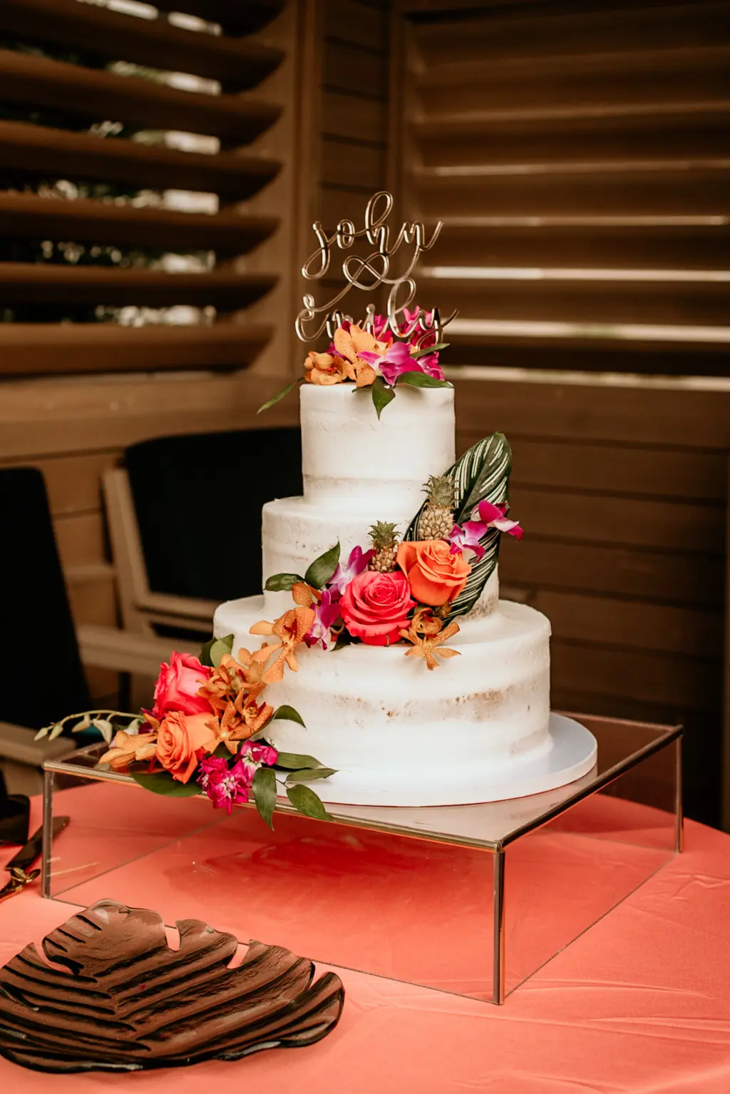 Round Three Tier Semi Naked White Wedding Cake with Bright Tropical Floral Detailing