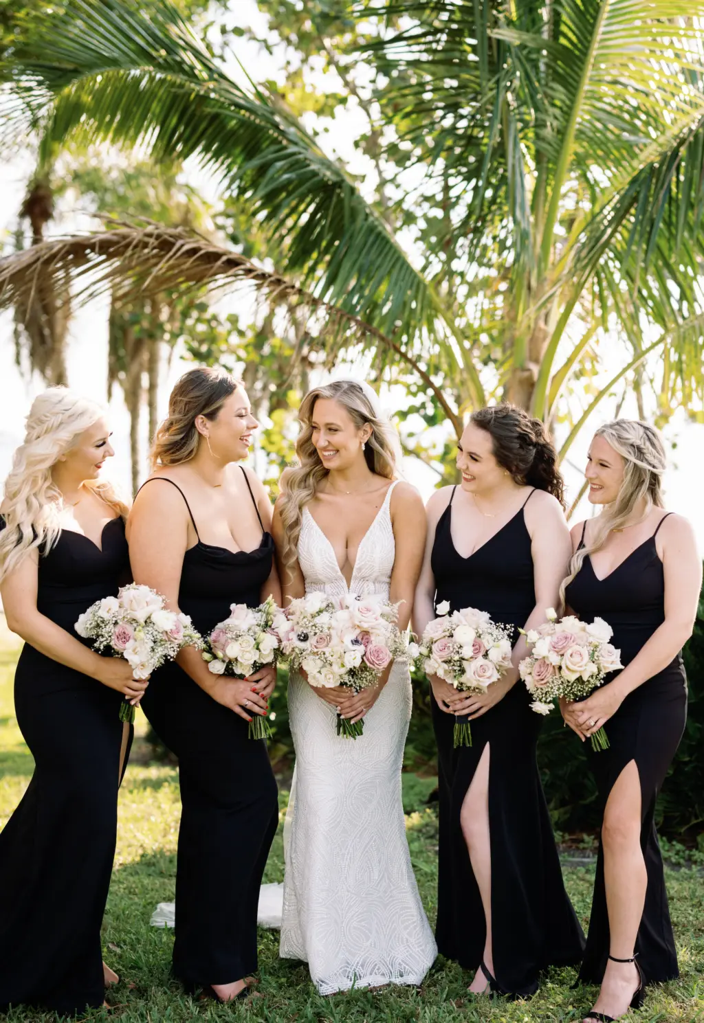 Formal Black Floor Length Windsor Bridesmaids Dresses with Slit | Made With Love Bridal Wedding Dress Inspiration | White and Blush Pink Spring Bouquets
