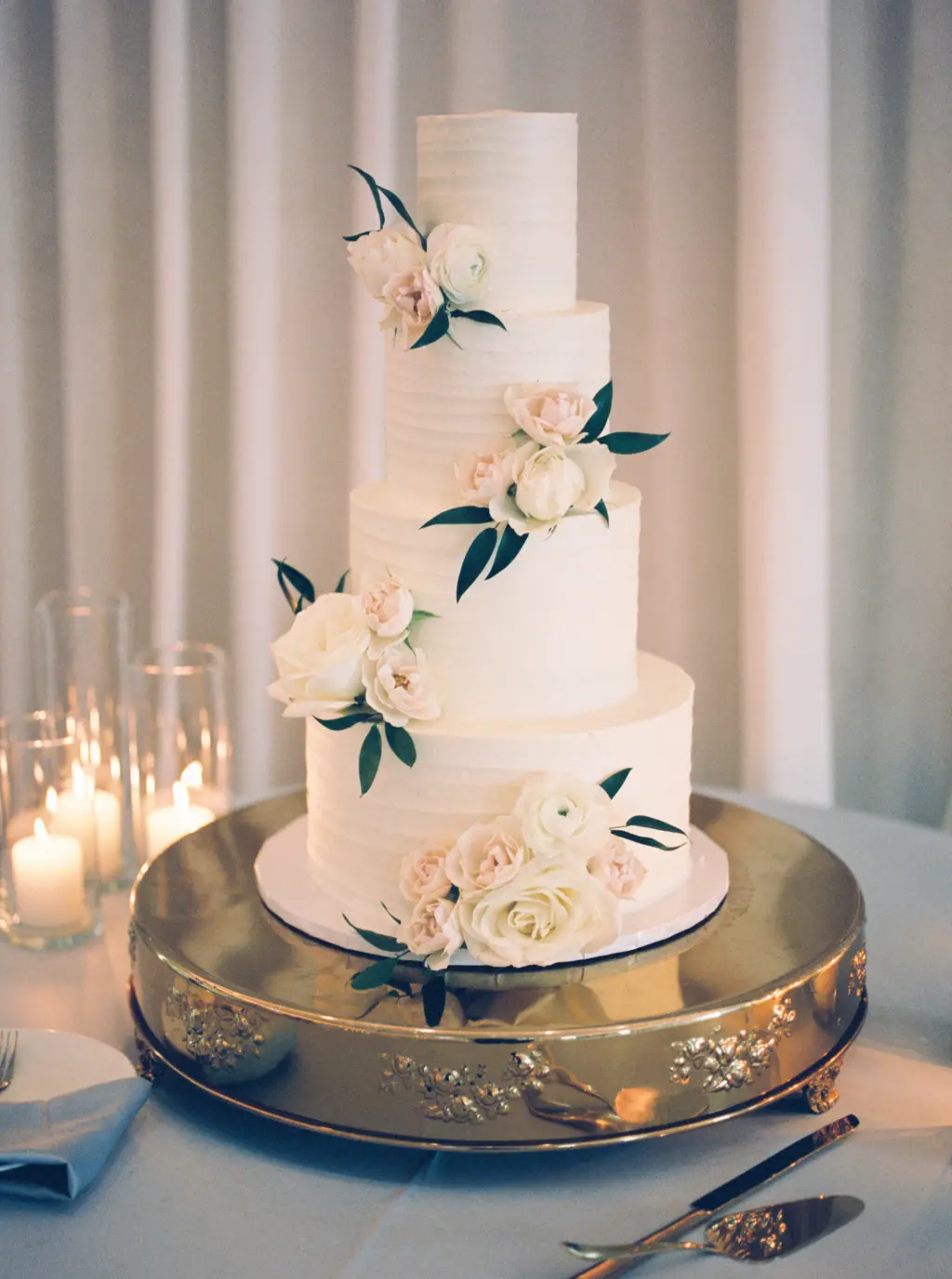 Round 4-tiered Wedding Cake with Rose Accents | Tampa Bay Cake Company