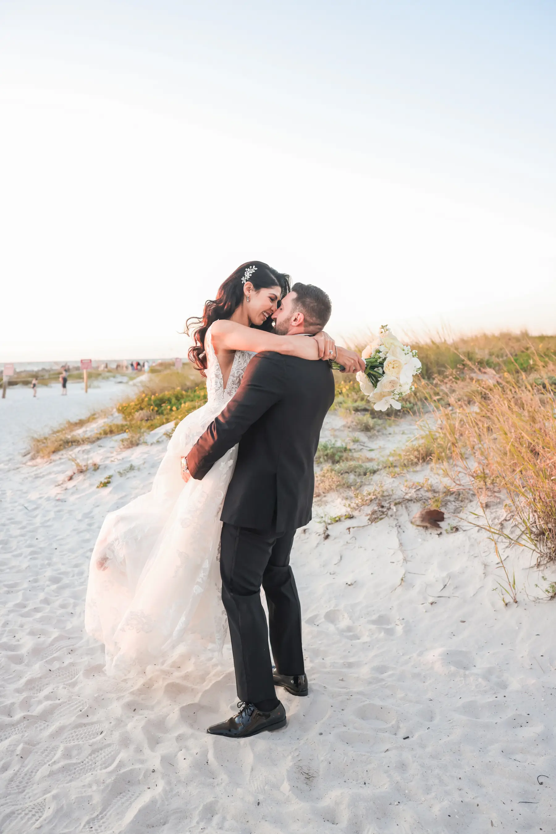 Bride and Groom Sunset Beach Wedding Portrait | Clearwater Photographer Lifelong Photography Studio | Planner Breezin' Weddings
