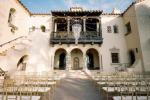 Romantic Outdoor Courtyard Wedding Ceremony Ideas | Crystal Chandelier Lighting | Gold Chiavari Chairs | Sarasota Venue Powel Crosley Estate
