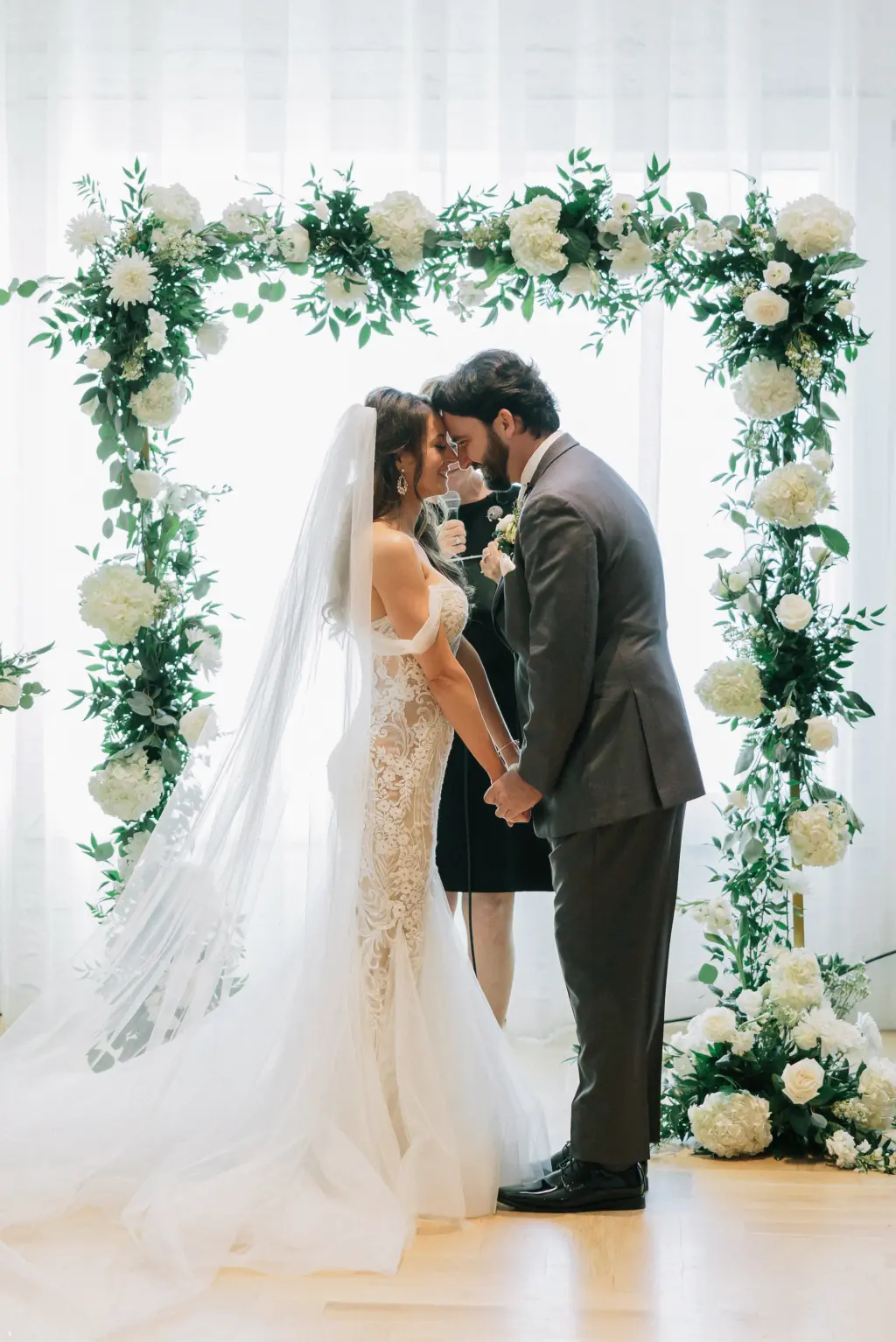 Bride and Groom Exchange Vows in Romantic White Gold and Greenery Wedding Ceremony | Planner EventFull Weddings | Venue Hotel Haya
