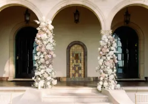 Asymmetrical Floral Wedding Ceremony Altar Ideas with Soft Pink Roses, Hydrangeas, Baby's Breath, and White Stock Flowers | Sarasota Venue Powel Crosley Estate
