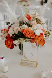 Boho Wedding Reception Inspiration | Orange, Pink, and White Roses with Greenery Centerpiece Ideas