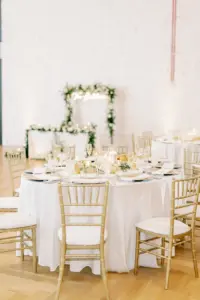 Romantic White Gold and Greenery Wedding Reception Inspiration with Gold Chiavari Chairs and White Linens | Tampa Bay Kate Ryan Event Rentals