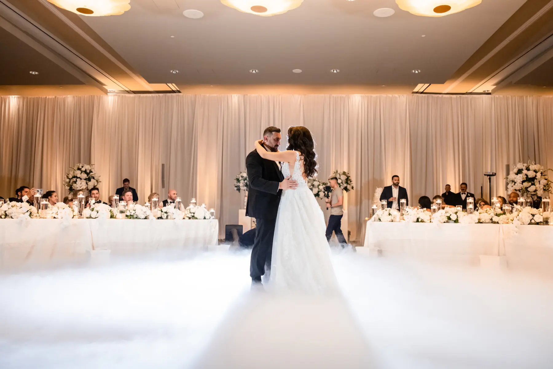 Bride and Groom Ballroom First Dance with Fog Machine Wedding Portrait | Photographer Lifelong Photography Studio | Clearwater Event Planner Breezin Weddings | Venue Opal Sands