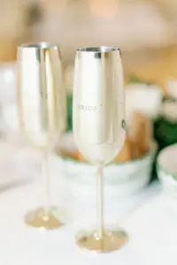 Gold and Glittery Bride and Groom Champagne Toasting Wedding Glasses