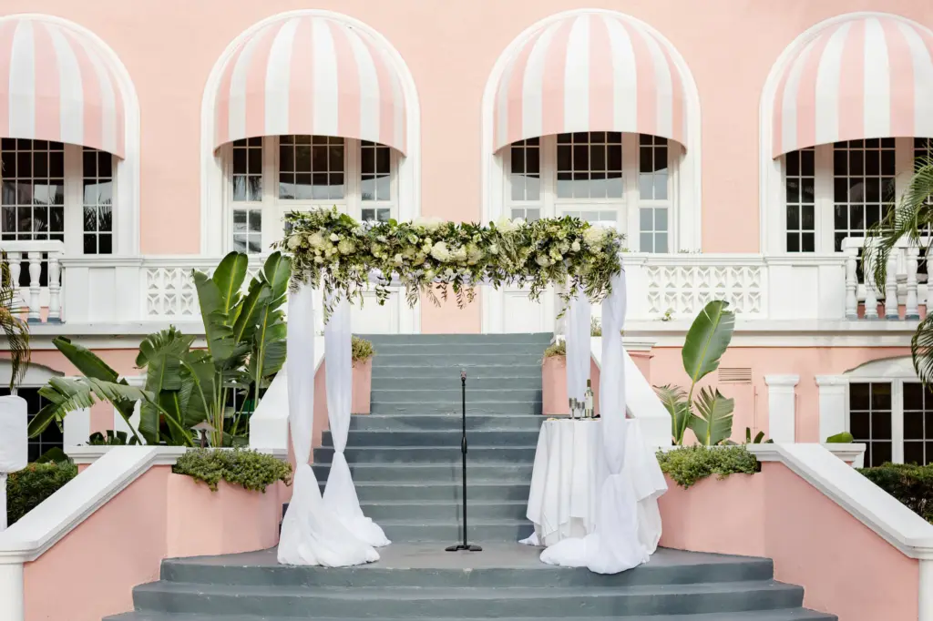Classic White and Greenery Tall Wedding Chuppah Ideas with Draping | St Pete Beach Florist Lemon Drops